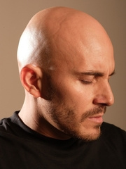 Bald hottie shows his uncut dick