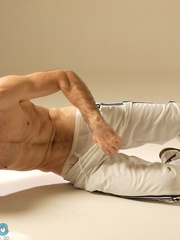 Hot athlete shows his perfect muscled body