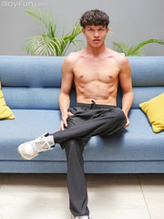 Hot curly twink Lucas Morries playing with his uncut cock