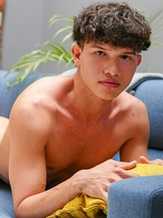 Hot curly twink Lucas Morries playing with his uncut cock
