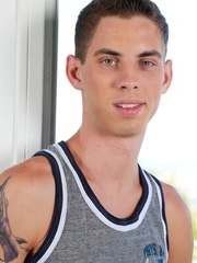 Skinny twink Sam Truitt shows his dick and poses in a solo
