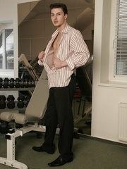 Leo Cooper strips in a gym