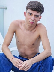 Skinny latino Liam Zuares playing with his uncut dick