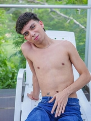 Skinny latino Liam Zuares playing with his uncut dick