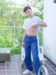 Skinny latino Liam Zuares playing with his uncut dick